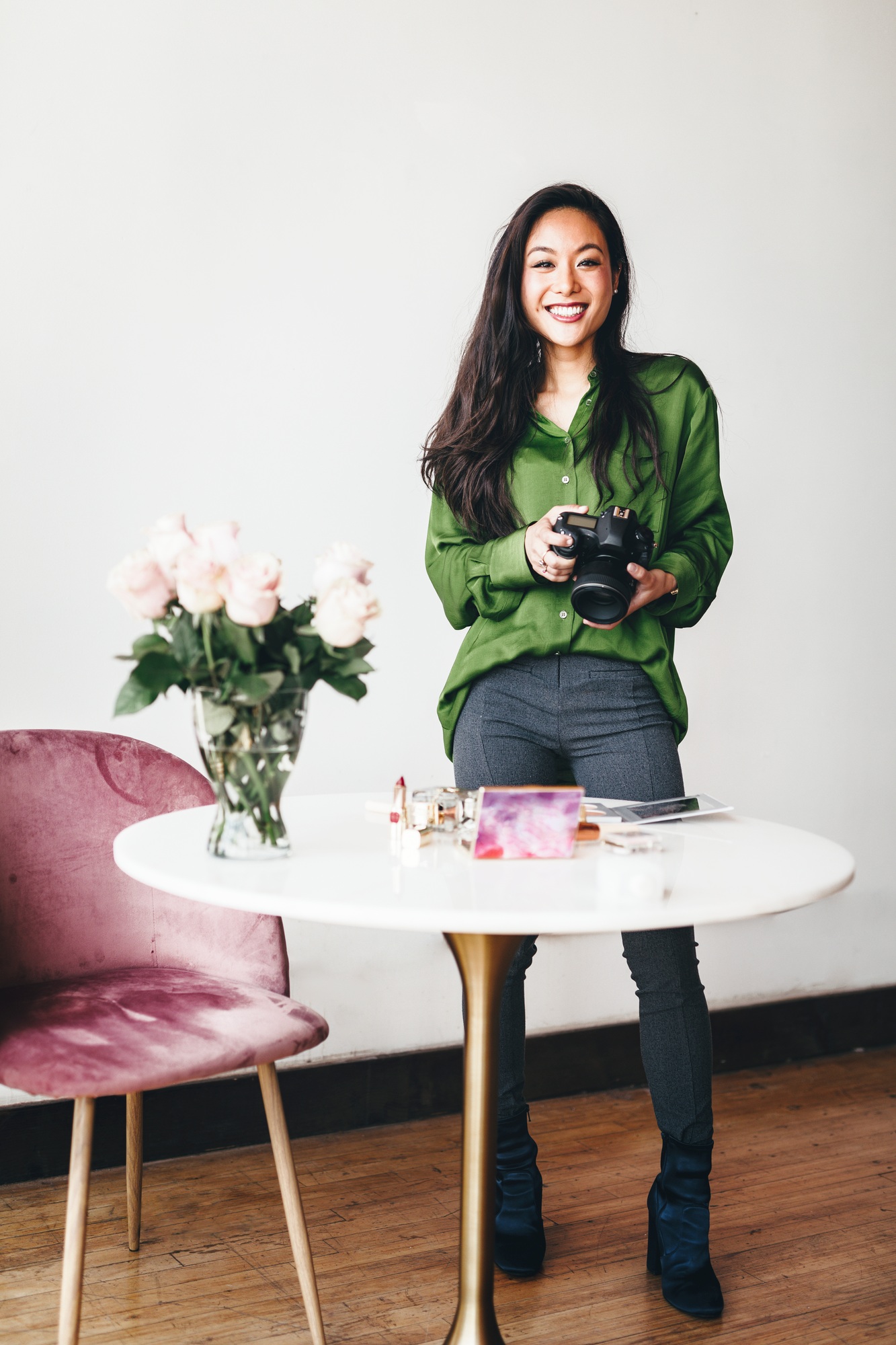 Beauty influencer holding a camera